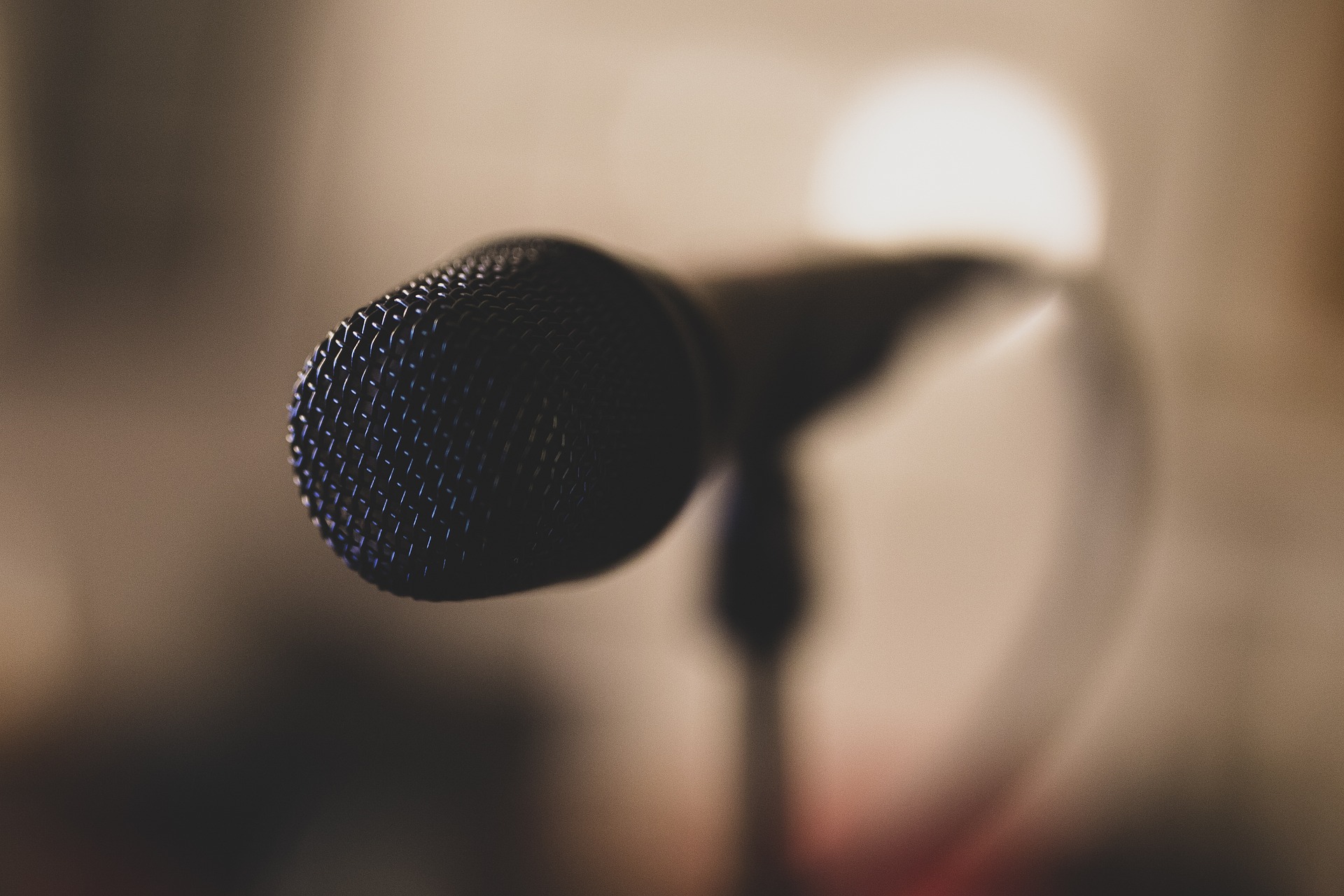 black microphone with blurred background